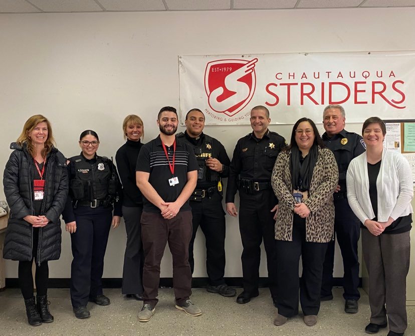 Pictured, from left to right: Director of Mentoring and Advocacy Erika Muecke; Fredonia Police Officer April Echevarria; Sergeant Rachael Waid; Training Director and Mentoring Coordinator Eimelec Perez; Chautauqua County Sheriff's Deputy Jacis Blake; Chautauqua County Sheriff Jim Quattrone; Solimar Vazquez, Secretary to Chautauqua County Executive; UPMC Chautauqua Security Officer James Rensel; Marketing & Resource Development Manager Nicole Gustafson. Photos by Jamestown Public Schools