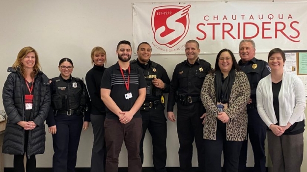 Pictured, from left to right: Director of Mentoring and Advocacy Erika Muecke; Fredonia Police Officer April Echevarria; Sergeant Rachael Waid; Training Director and Mentoring Coordinator Eimelec Perez; Chautauqua County Sheriff's Deputy Jacis Blake; Chautauqua County Sheriff Jim Quattrone; Solimar Vazquez, Secretary to Chautauqua County Executive; UPMC Chautauqua Security Officer James Rensel; UWAY SCC Marketing & Resource Development Manager Nicole Gustafson. Photos by Jamestown Public Schools